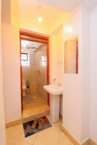Phòng tắm tại Pamstays +4 ảnh