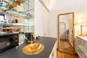 Kuchyň nebo kuchyňský kout v ubytování Garçonnière