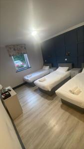 Katil atau katil-katil dalam bilik di N20 Inn Hotel