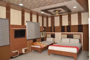 Postel nebo postele na pokoji v ubytování Hotel mild inn