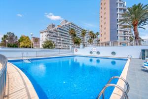 Bazén v ubytování Apartamento Familiar en Calpe nebo v jeho okolí