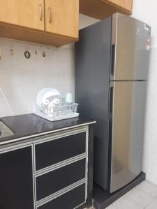 Kuchyň nebo kuchyňský kout v ubytování Cozy AiZHome