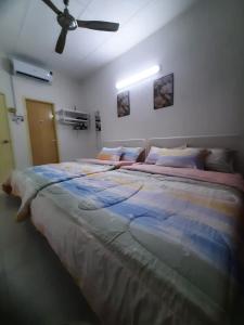 Postel nebo postele na pokoji v ubytování Cozy AiZHome