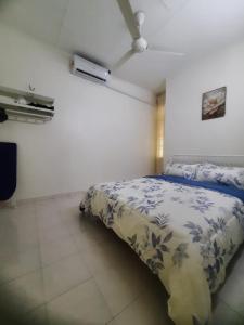 Postel nebo postele na pokoji v ubytování Cozy AiZHome + 2 fotografie