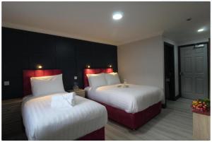 Katil atau katil-katil dalam bilik di N20 Inn Hotel