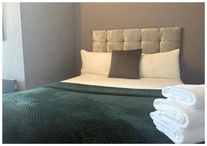 Postel nebo postele na pokoji v ubytování Hotel Anfield