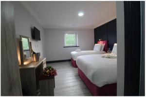 Katil atau katil-katil dalam bilik di N20 Inn Hotel