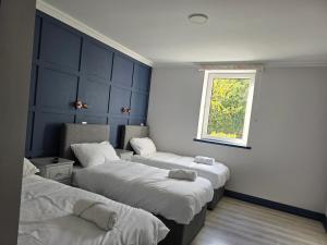 Katil atau katil-katil dalam bilik di N20 Inn Hotel