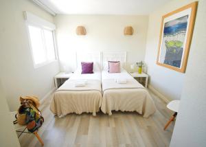 Postel nebo postele na pokoji v ubytování Apartamentos Strand Jávea