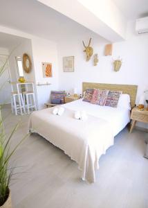 Postel nebo postele na pokoji v ubytování Apartamentos Strand Jávea