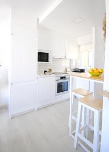 Kuchyň nebo kuchyňský kout v ubytování Apartamentos Strand Jávea