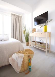 Postel nebo postele na pokoji v ubytování Apartamentos Strand Jávea