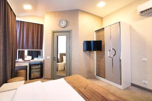 TV a/nebo společenská místnost v ubytování Sunday Boutique Hotel