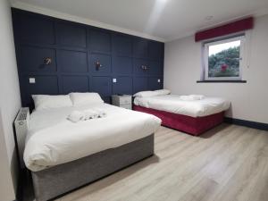 Katil atau katil-katil dalam bilik di N20 Inn Hotel