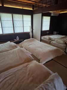 Voodi või voodid majutusasutuse 1日1組限定 田舎体験 古民家宿 樹々庵 Juju-an toas