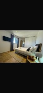 En eller flere senge i et værelse på Loue Villa Bonifacio vue mer