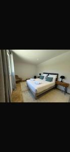 En eller flere senge i et værelse på Loue Villa Bonifacio vue mer