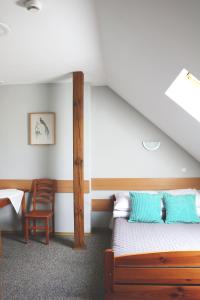 Postel nebo postele na pokoji v ubytování Rejman Noclegi