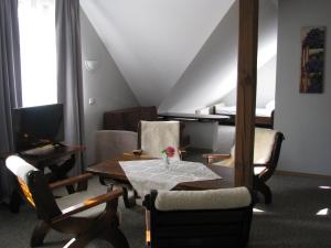 Posezení v ubytování Rejman Noclegi