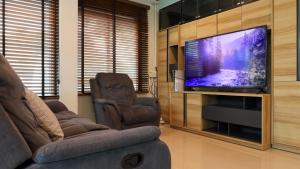 Et tv og/eller underholdning på Airport Villa Bangkok