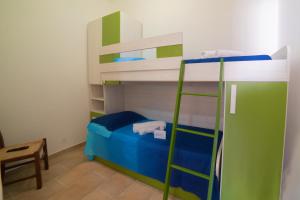 Postel nebo postele na pokoji v ubytování Villa Benedetta On SeaShore - Happy Rentals