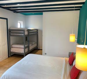 Hôtel l'Hippocampe客房内的一张或多张床位