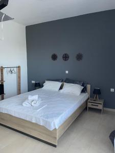 Postel nebo postele na pokoji v ubytování Vesper Rooms