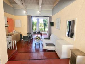A television and/or entertainment centre at Barbati Beach Apartments