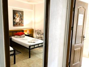 Postel nebo postele na pokoji v ubytování Taxi Hostel