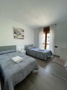 Posteľ alebo postele v izbe v ubytovaní Apartamento Rústico