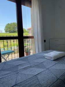 Posteľ alebo postele v izbe v ubytovaní Apartamento Rústico