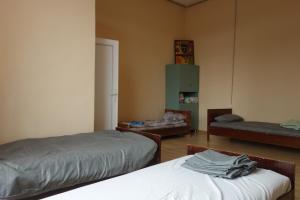 Postel nebo postele na pokoji v ubytování Nomads Nest + 6 fotografií