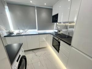 Η κουζίνα ή μικρή κουζίνα στο PARIS à 15 minutes- Grand Appartement 5 Pièces +21 φωτογραφίες
