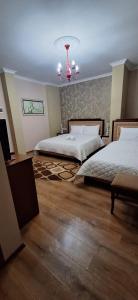 Postel nebo postele na pokoji v ubytování Hotel Theo + 16 fotografií