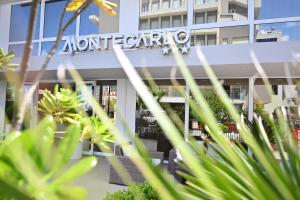 a view of the front of the montclair building at Hotel B&B Montecarlo in Milano Marittima