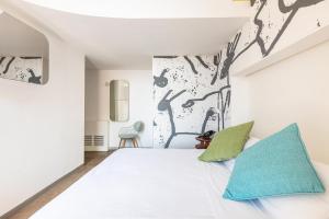 Postel nebo postele na pokoji v ubytování Xilhotel by Perle di Puglia