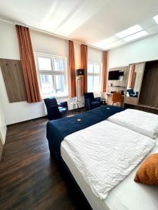 Postel nebo postele na pokoji v ubytování Hotel Am Dom + 37 fotografií