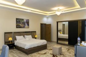 Voodi või voodid majutusasutuse Maktub Pyramids Hotel toas