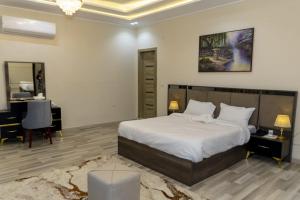 Voodi või voodid majutusasutuse Maktub Pyramids Hotel toas