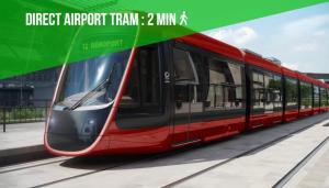 a red train is parked at a train station at Le SEPT MARTINE Hyper centre - Air-conditioned - Terrace - Quiet - Wifi - Tramway in Nice