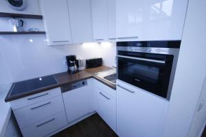 Kuchyň nebo kuchyňský kout v ubytování Klabautermann 5 + 7 fotografií