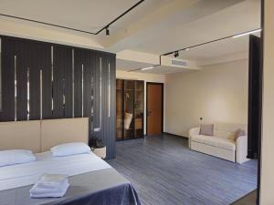 Voodi või voodid majutusasutuse Tskaltubo Epic Hotel & Spa toas