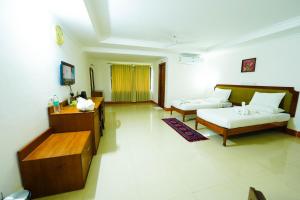 TV a/nebo společenská místnost v ubytování Hotel Golden Anchor ,Paradeep