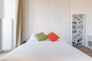 Postel nebo postele na pokoji v ubytování Xilhotel by Perle di Puglia