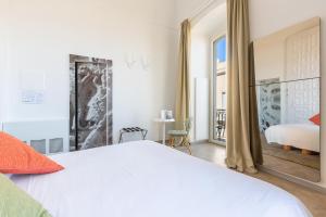 Postel nebo postele na pokoji v ubytování Xilhotel by Perle di Puglia