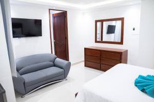 Postel nebo postele na pokoji v ubytování Cataleya Hotel
