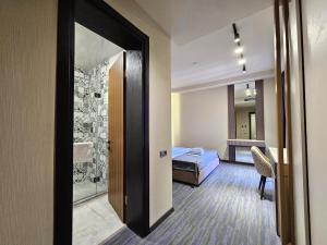 Voodi või voodid majutusasutuse Tskaltubo Epic Hotel & Spa toas