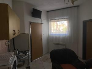 Μια τηλεόραση ή/και κέντρο ψυχαγωγίας στο Lav Apartments