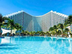a view of the resort from the pool at Arena jakovi condotel in Cam Ranh International Airport