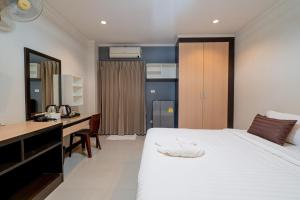 Postel nebo postele na pokoji v ubytování JT Place Buriram + 56 fotografií